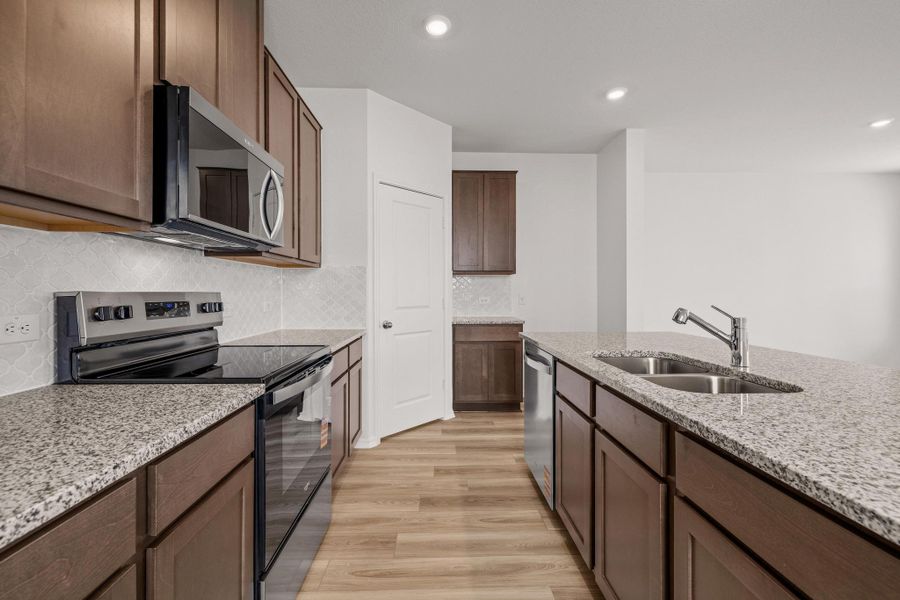 Furnished interior view inside a new home in Sonterra - Cool Water, Jarrell (Image 12).