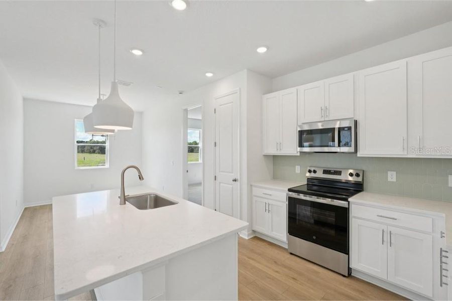 Furnished interior view inside a new home in Trailside, Mount Dora (Image 3). Furnished interior view inside a new home in Trailside, Mount Dora (Image 3).