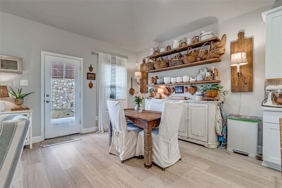 Dining room featuring light wood-style floors Dining room featuring light wood-style floors