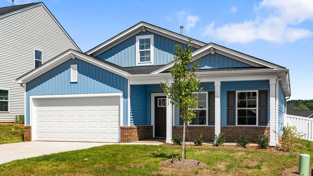 Front exterior of a new home in Hanes Lake, Winston-Salem, NC, highlighting curb appeal (Image 2). Front exterior of a new home in Hanes Lake, Winston-Salem, NC, highlighting curb appeal (Image 2).