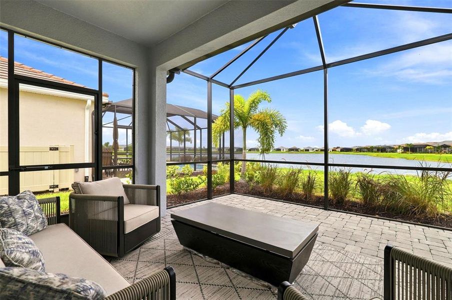 Exterior details and patio area of a home in Esplanade at Azario Lakewood Ranch, Bradenton (Image 3). Exterior details and patio area of a home in Esplanade at Azario Lakewood Ranch, Bradenton (Image 3).