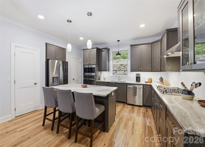 Furnished interior view inside a new home in , Waynesville (Image 8).