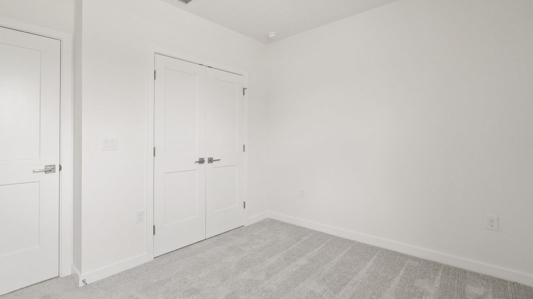 Representative furnished interior of a home built from the Flagler by DRB Homes in Grasslands West, Lakeland (Image 26).