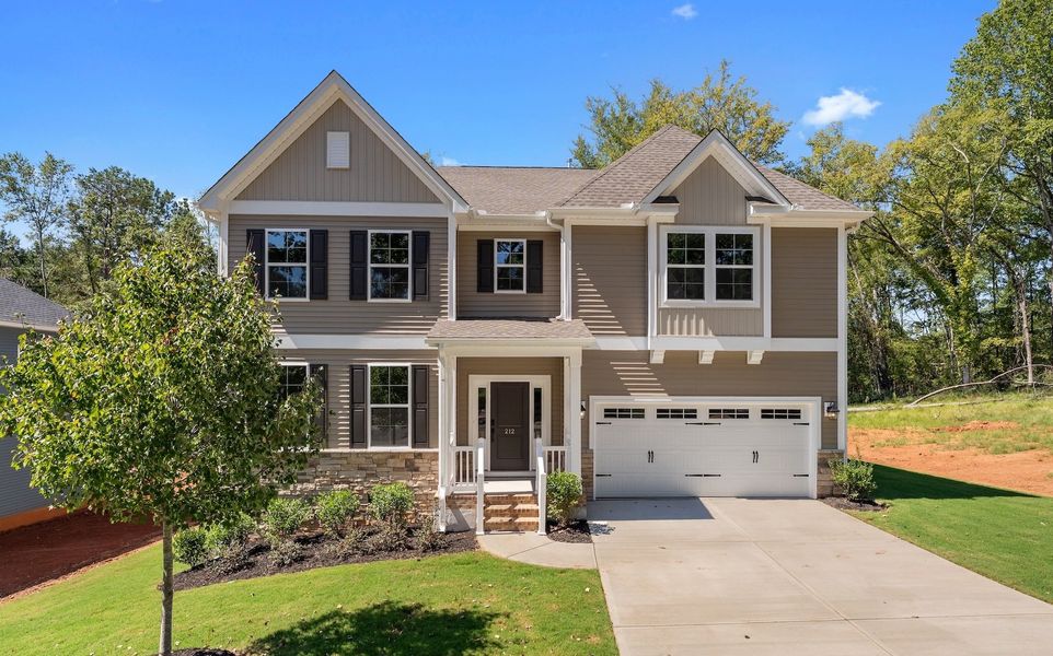 Front exterior of a new home in Timberland Grove, Anderson, SC, highlighting curb appeal (Image 1). Front exterior of a new home in Timberland Grove, Anderson, SC, highlighting curb appeal (Image 1).