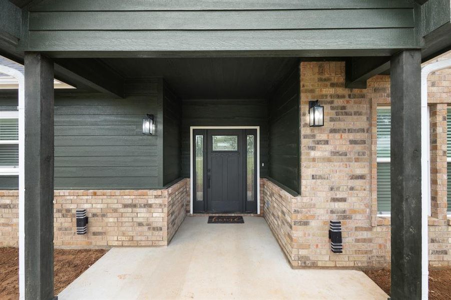 Exterior details and patio area of a home in , Sunset (Image 3).