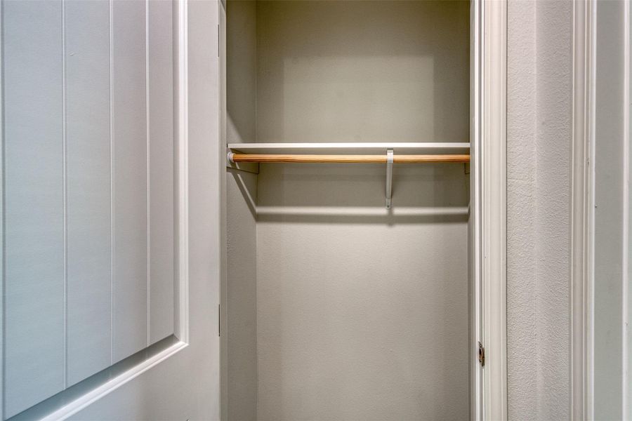 An organized closet offers optimal storage potential with a high shelf and sturdy hanging rod. An organized closet offers optimal storage potential with a high shelf and sturdy hanging rod.