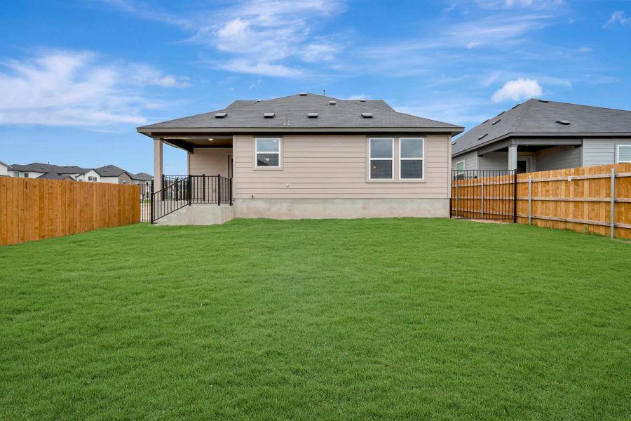 Exterior details and patio area of a home in Cascades at Onion Creek, Austin (Image 3).