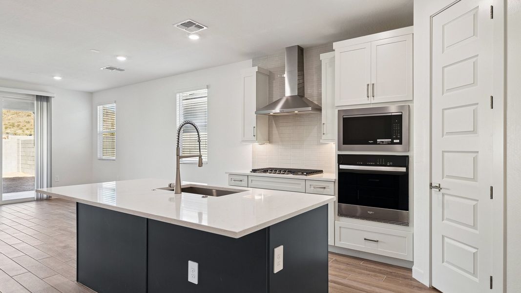 Representative furnished interior of a home built from the Hayden by D.R. Horton in The Ridge at Stone Butte, Phoenix (Image 10).