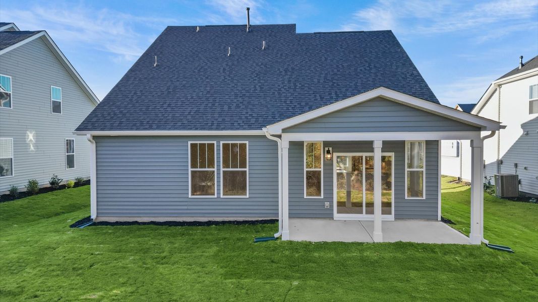 Vibrant rear outdoor space featuring a covered porch and exceptional craftsmanship Vibrant rear outdoor space featuring a covered porch and exceptional craftsmanship