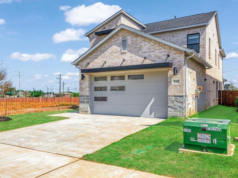 Front exterior of a new home in Royal Court, Little Elm, TX, highlighting curb appeal (Image 17).