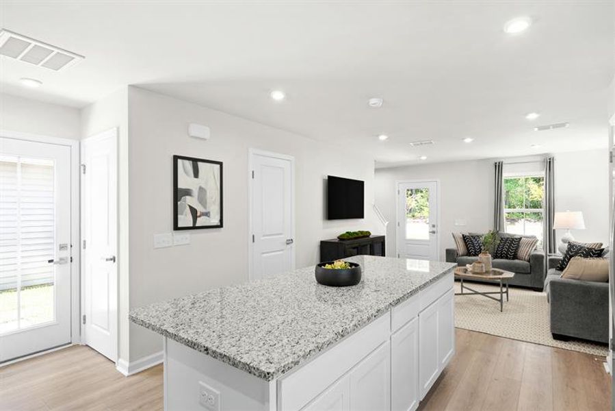 Representative furnished interior of a home built from the Reese by Ryan Homes in Middle Creek Village Coastal Cottages & Villas, Bolivia (Image 8).