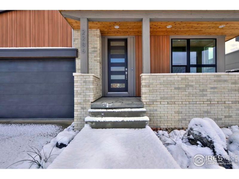 Exterior details and patio area of a home in Northstar, Longmont (Image 3).