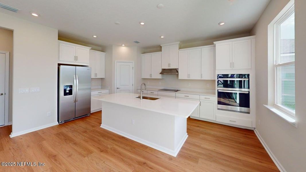 Furnished interior view inside a new home in Lakes at Bella Lago, Green Cove Springs (Image 3). Furnished interior view inside a new home in Lakes at Bella Lago, Green Cove Springs (Image 3).