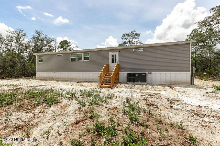 Exterior details and patio area of a home in , Florahome (Image 23).