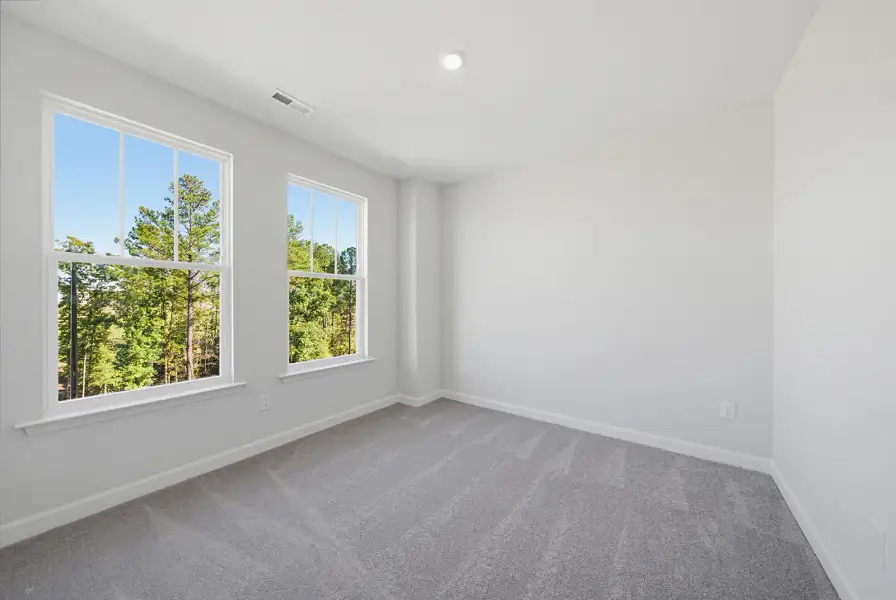 Spacious, unfurnished interior of a new home in Sweetbrier, Durham (Image 34).