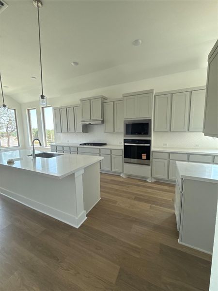 Light & Bright Open Concept Kitchen with large center island