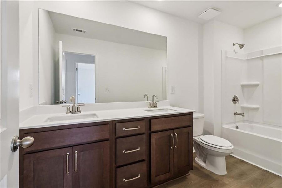Furnished interior view inside a new home in Eastlyn Crossing, Flowery Branch (Image 9). Furnished interior view inside a new home in Eastlyn Crossing, Flowery Branch (Image 9).