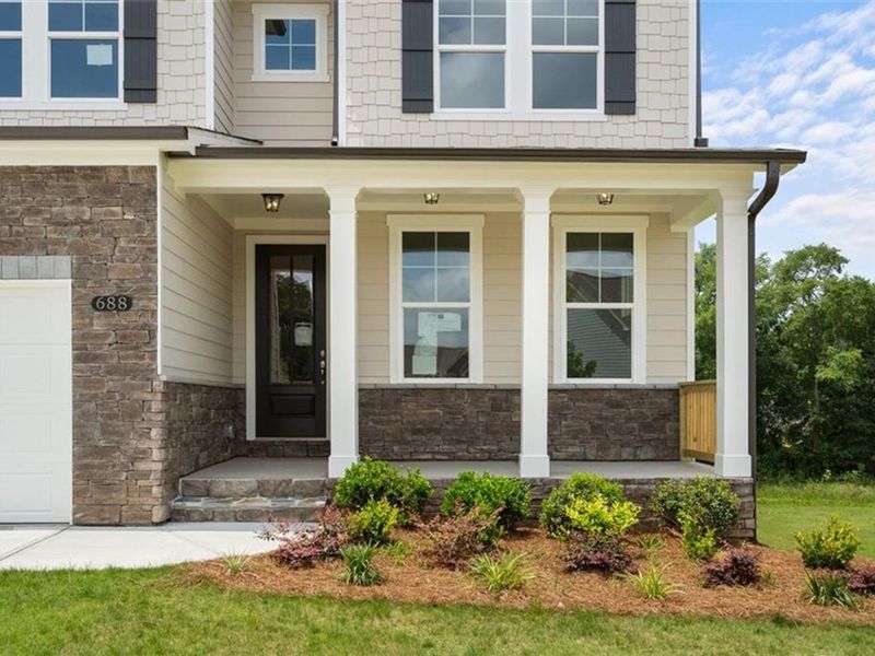Exterior details and patio area of a home in Wehunt Meadows, Hoschton (Image 2).