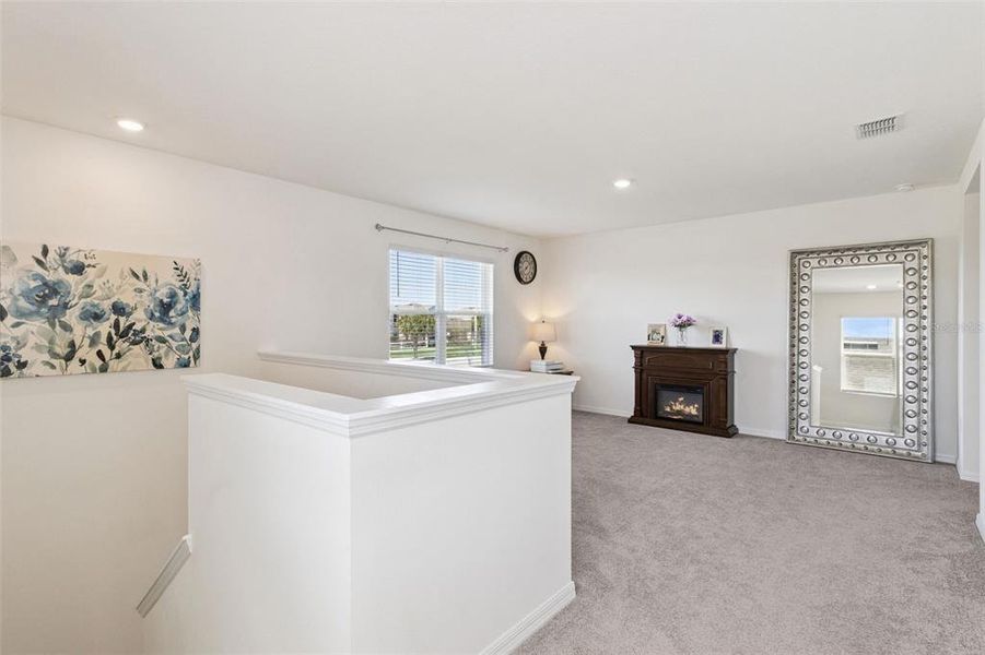 Furnished interior view inside a new home in Harmony at Lake Eloise, Winter Haven (Image 29).