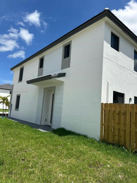 Exterior details and patio area of a home in , Homestead (Image 3).