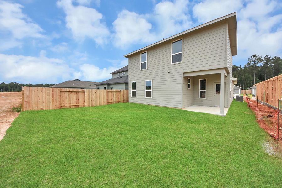 Exterior details and patio area of a home in The Enclave at Spring Branch, Conroe (Image 4).