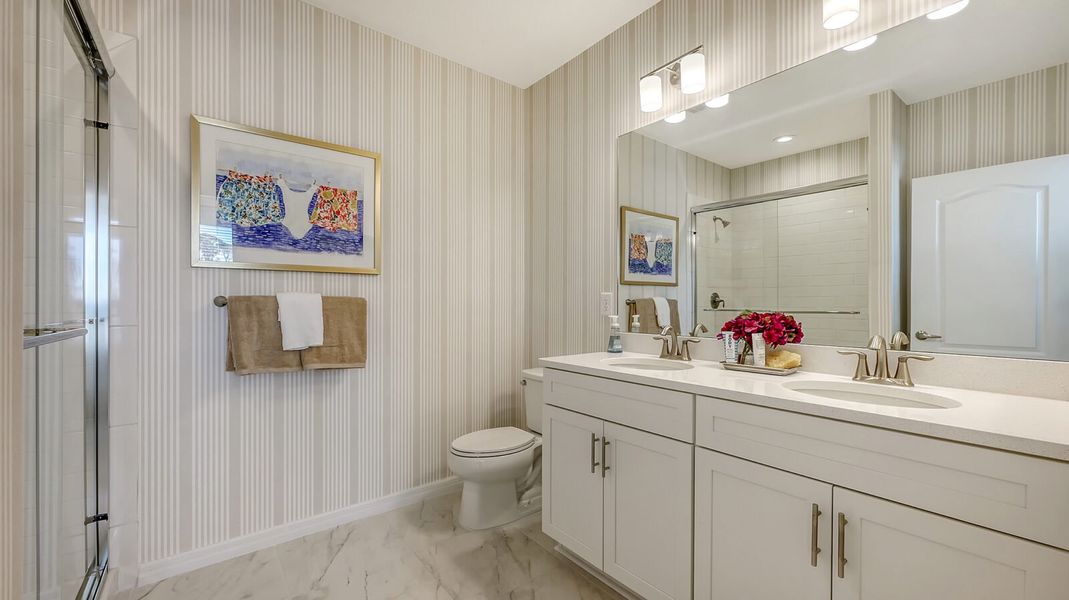 Representative furnished interior of a home built from the Avery by Neal Communities in Grand Park, Sarasota (Image 41).