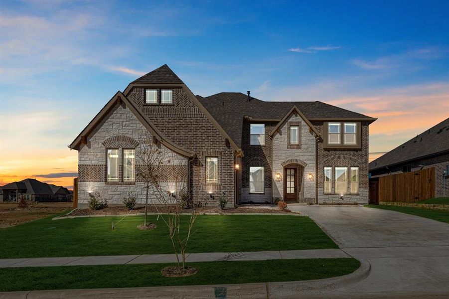 Front exterior of a new home in Parks at Panchasarp Farms 55-60, Burleson, TX, highlighting curb appeal (Image 26).