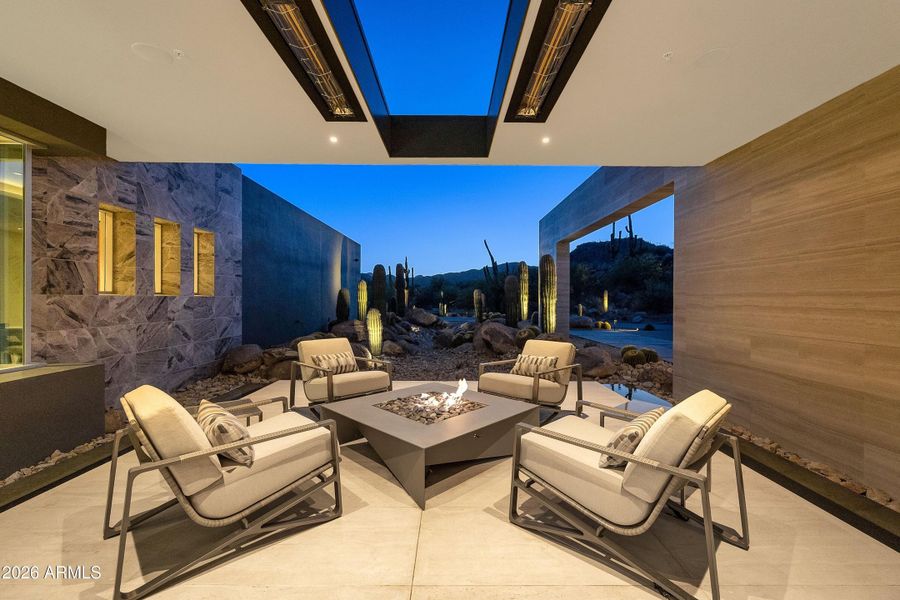 Front Patio with Origami Firepit and Hea