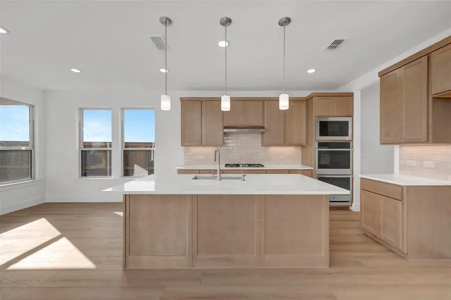 Furnished interior view inside a new home in Lily Creek at Sutton Fields, Aubrey (Image 5).