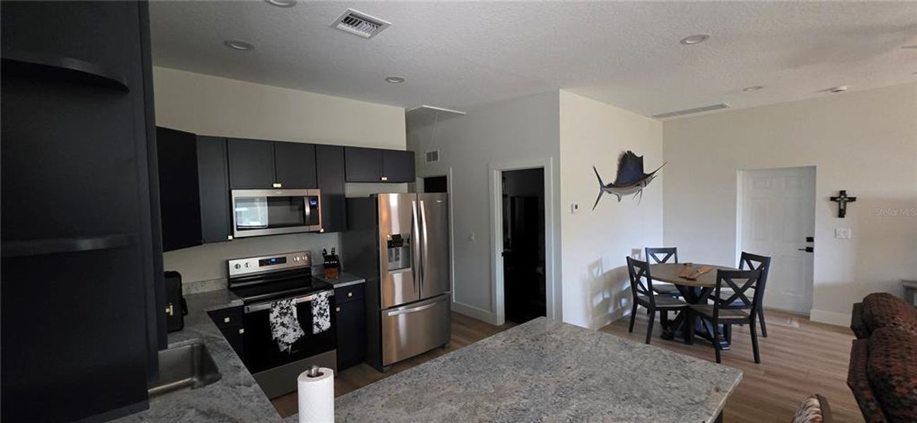 Furnished interior view inside a new home in , Okeechobee (Image 8). Furnished interior view inside a new home in , Okeechobee (Image 8).