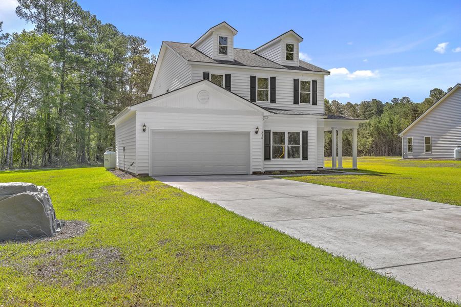 Front exterior of a new home in , Dorchester, SC, highlighting curb appeal (Image 26).
