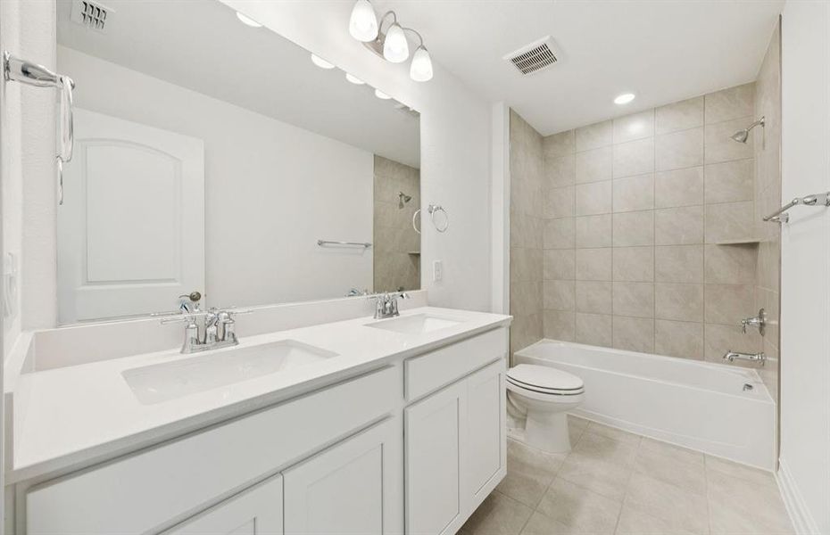Spacious secondary bathroom with double sinks