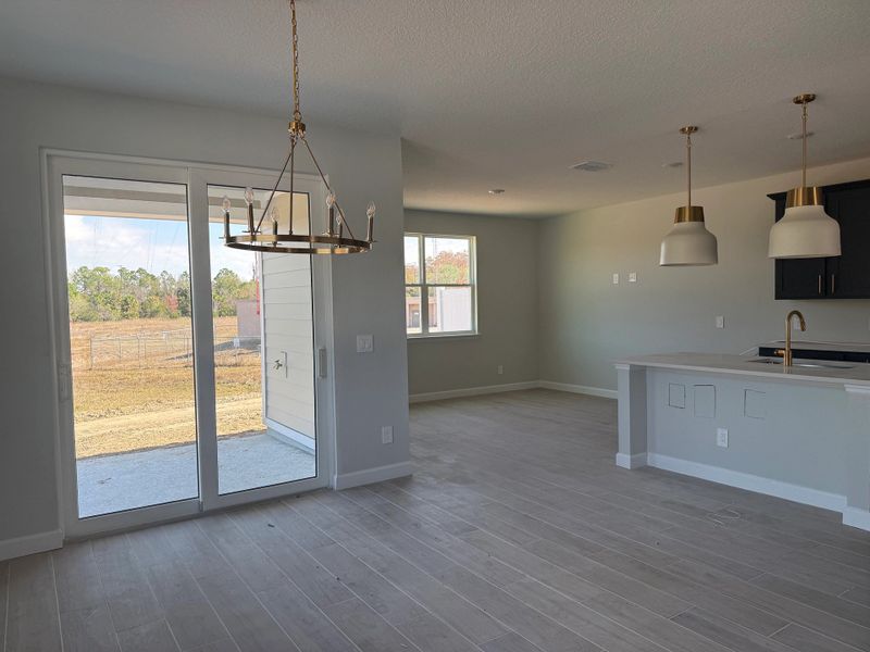Foyer opens up into bright and airy dining space