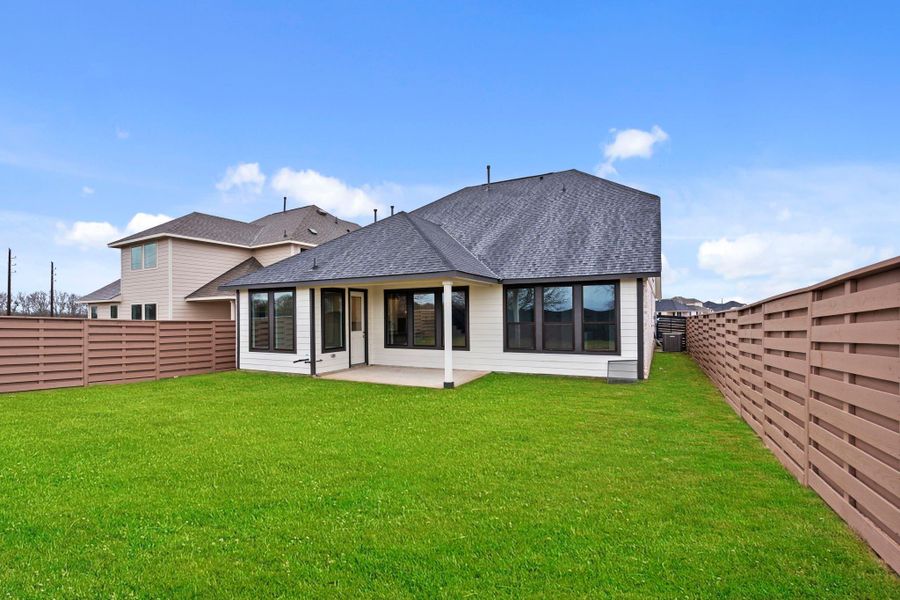 A perfect sized backyard and covered patio are the recipe for hosting success.