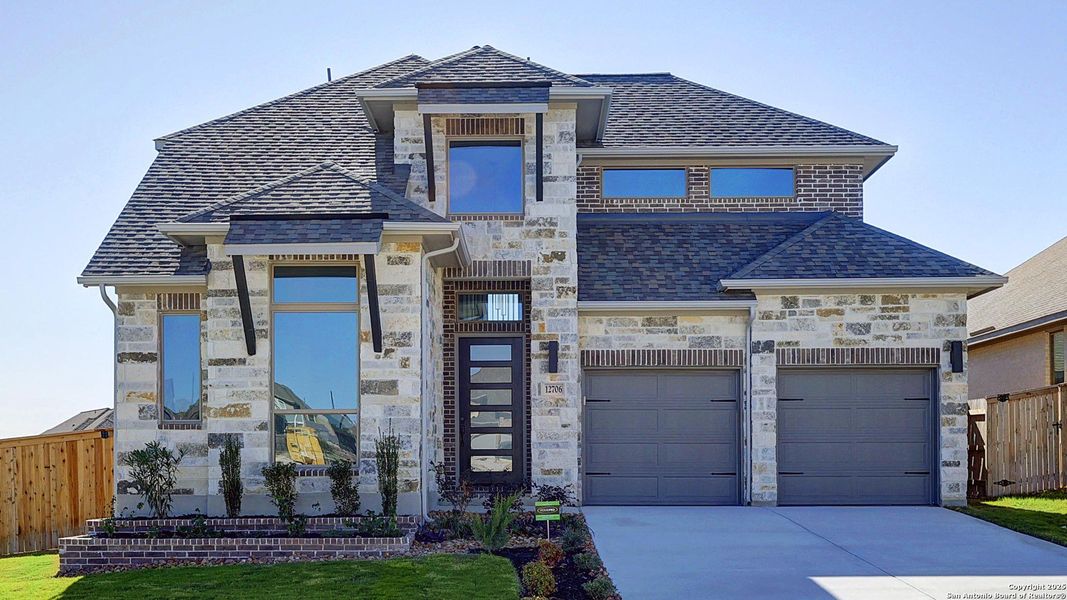 Front exterior of a new home in Arcadia Ridge 50', San Antonio, TX, highlighting curb appeal (Image 20).