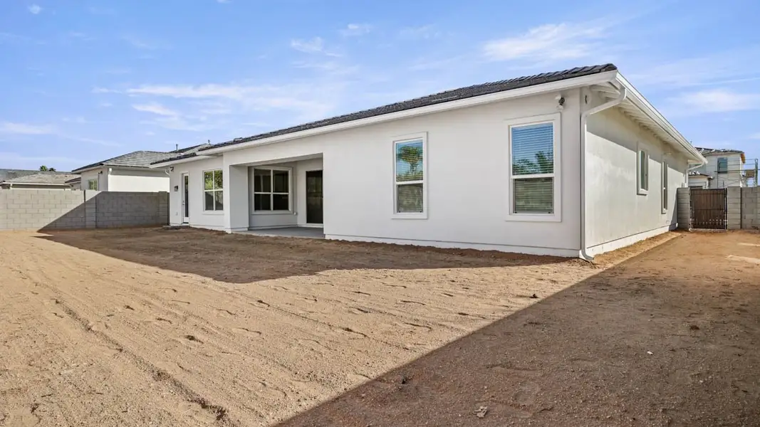 Exterior details and patio area of a home in Zanjero Pass, Waddell (Image 3).
