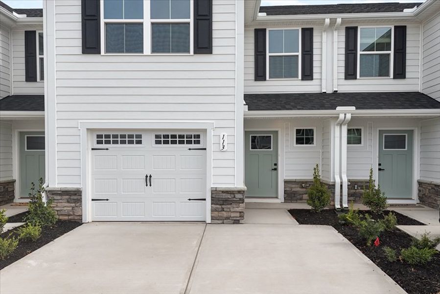 Exterior details and patio area of a home in Canterbrook Farms, Fountain Inn (Image 2).