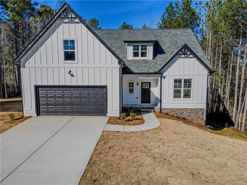 Front exterior of a new home in , Villa Rica, GA, highlighting curb appeal (Image 15). Front exterior of a new home in , Villa Rica, GA, highlighting curb appeal (Image 15).