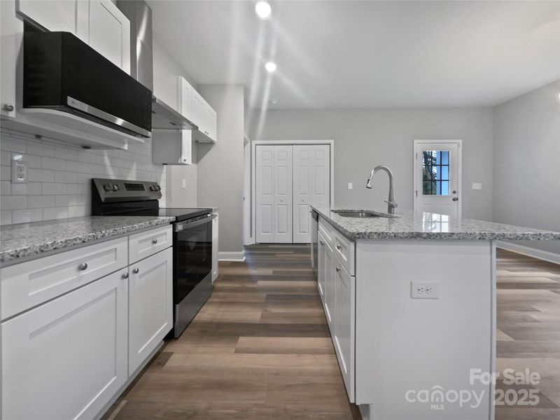 Furnished interior view inside a new home in , Statesville (Image 4).