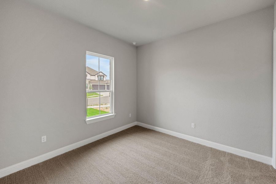 Unfurnished room featuring carpet floors and baseboards Unfurnished room featuring carpet floors and baseboards