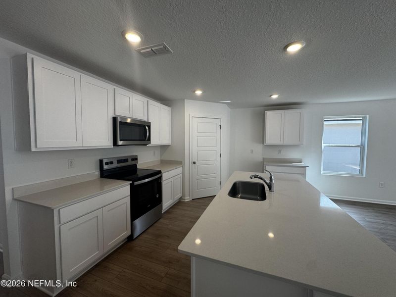 Furnished interior view inside a new home in Copes Landing, Jacksonville (Image 23).