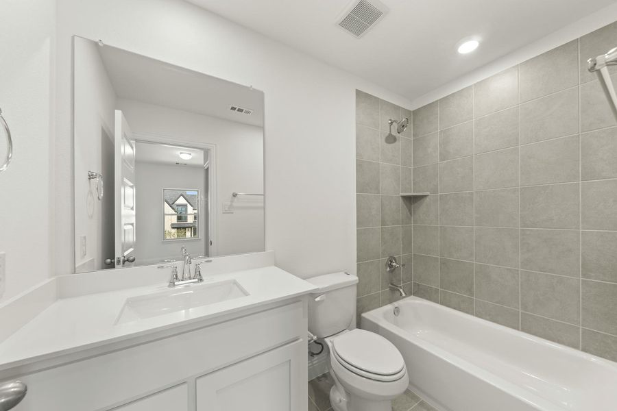 Furnished interior view inside a new home in Park Trails, Forney (Image 18).