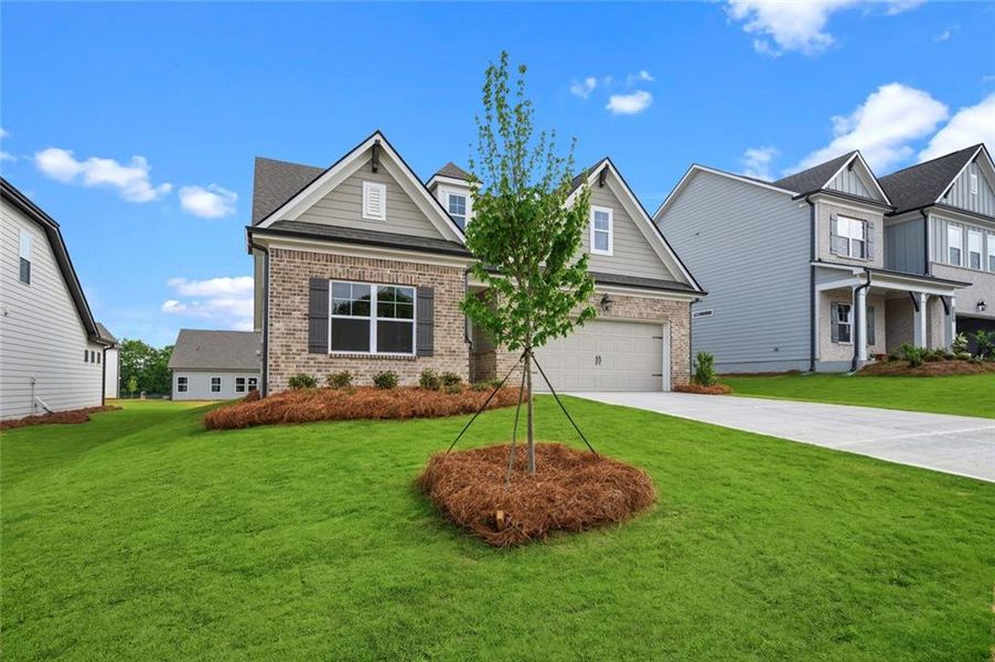 Front exterior of a new home in Summerlin, Winder, GA, highlighting curb appeal (Image 22).