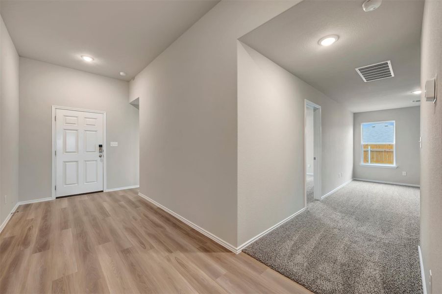 Spacious, unfurnished interior of a new home in Carillon, Manor (Image 21).