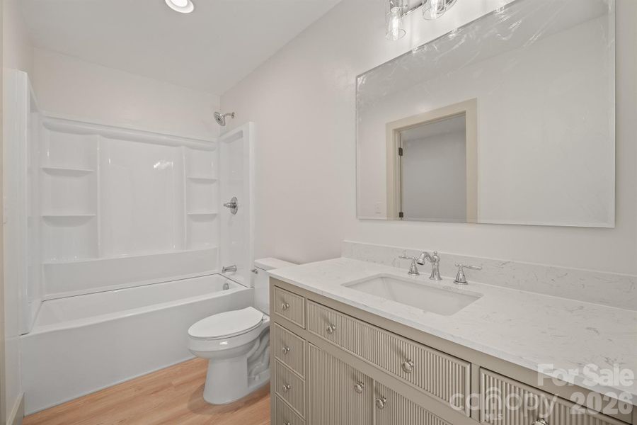 Furnished interior view inside a new home in , Newton (Image 7).