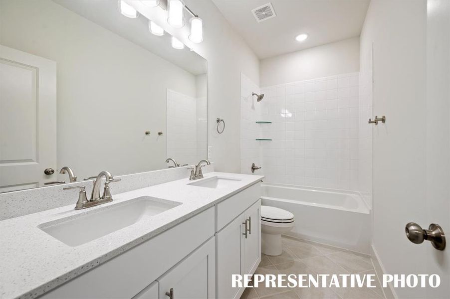 Everyone will enjoy their own space in this lovely guest bath!  REPRESENTATIVE PHOTO