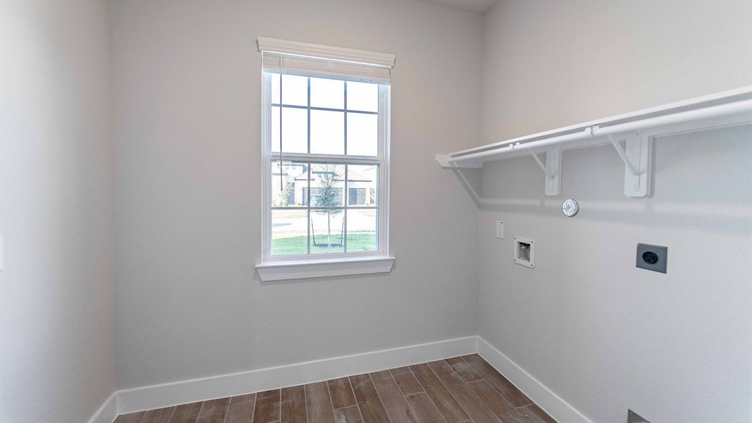 Spacious, unfurnished interior of a new home in Sunterra, Katy (Image 34).
