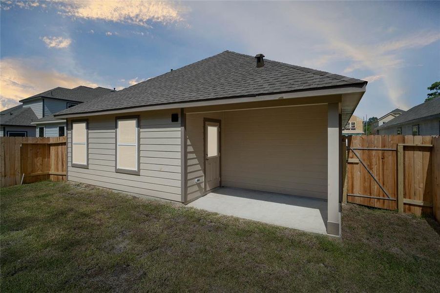 Come and see this spacious backyard with its beautiful covered patio. There is plenty of room for the kids to play and adults to relax! Perfect for your outdoor living space, patio furniture, bbq pit, and so much more. The possibilities are endless!