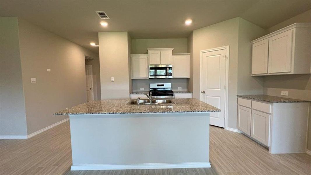 Furnished interior view inside a new home in Rosewood at Beltmill, Fort Worth (Image 6). Furnished interior view inside a new home in Rosewood at Beltmill, Fort Worth (Image 6).