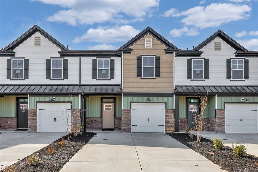 These modern townhomes feature individual garages These modern townhomes feature individual garages